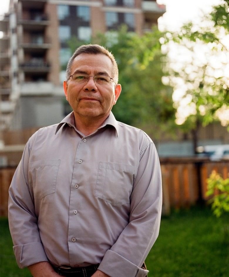 A portrait of a smiling man. 