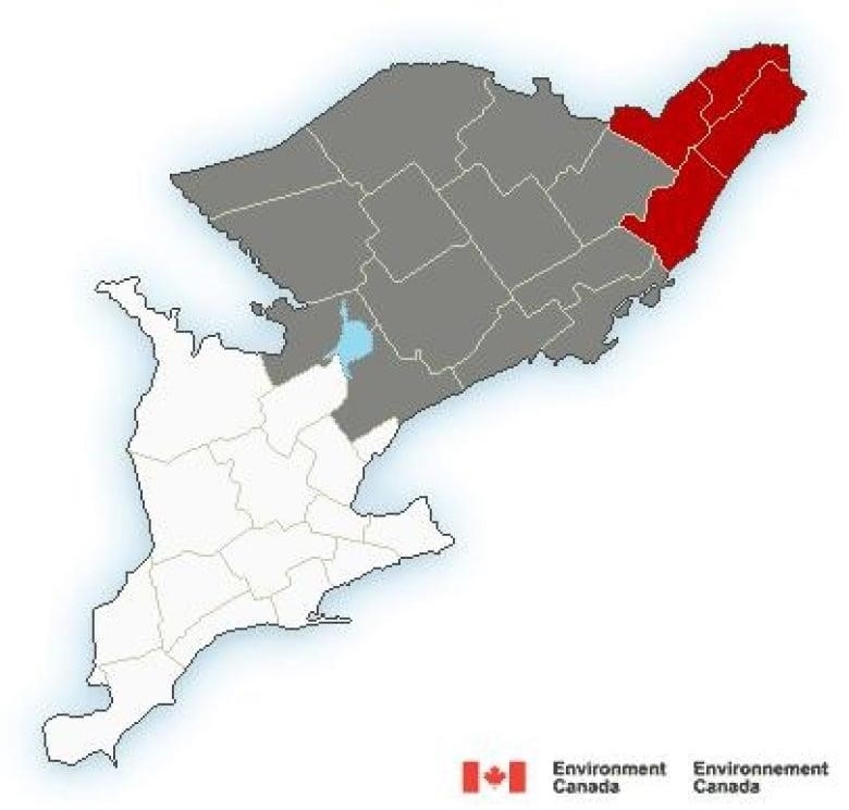  A colour-coded map of southern Ontario is split between white, grey and red.