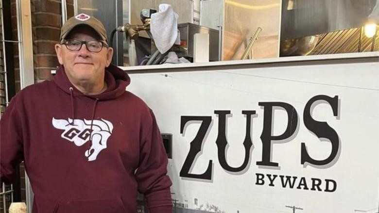 John Hennessy in front of his ZUPS ByWard storefront. 