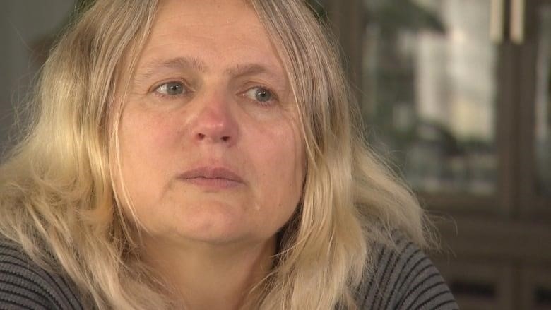 Olga Ostapiv sits in her house in Edmonton as she speaks with CBC News.