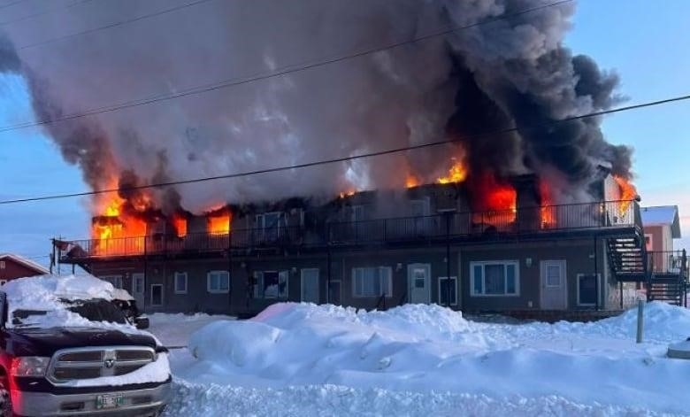 A residential apartment complex goes up in flames.