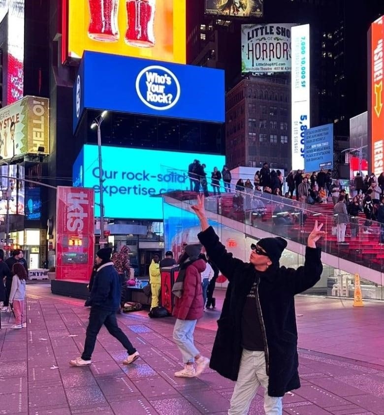 Wabano posing in New York's Times Square
