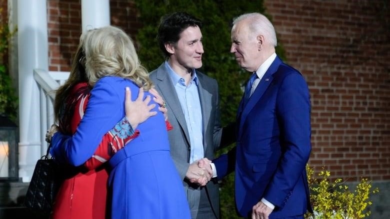 President Joe Biden and first lady Jill Biden are greeted by Prime Minister Justin Trudeau and his wife Sophie Gregoire Trudeau at Rideau Cottage.