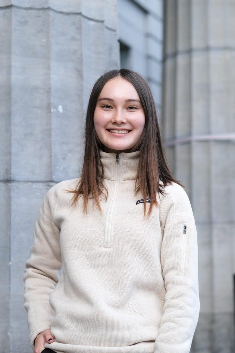 A woman smiling. 