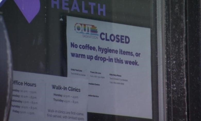 A poster reading OUTSaskatoon closed.