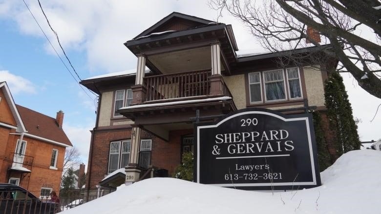 A house with a law firm sign.