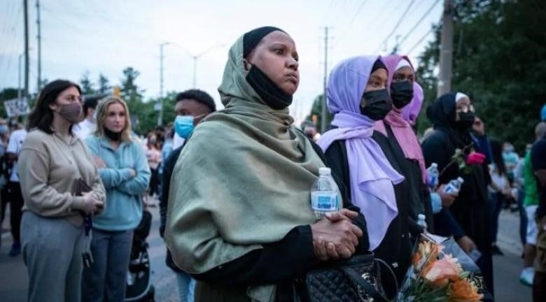 Thousands attend a vigil for four members of a family killed in an attack Prime Minister Justin Trudeau called an ‘act of terrorism,’ during a speech at the London Muslim Mosque on June 8, 2021. 