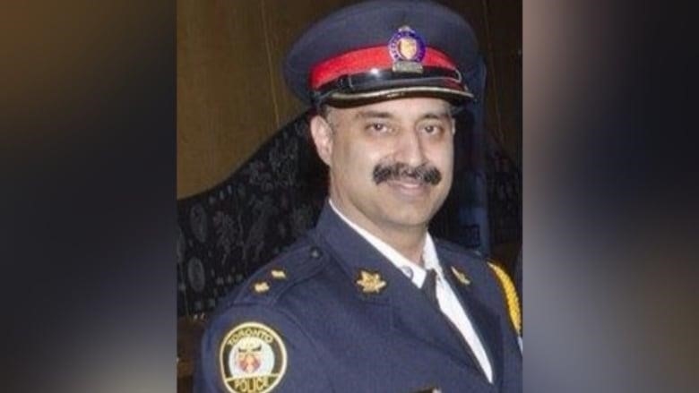 A male Toronto police officer in uniform.