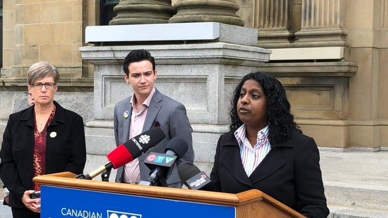 Woman speaking at podium