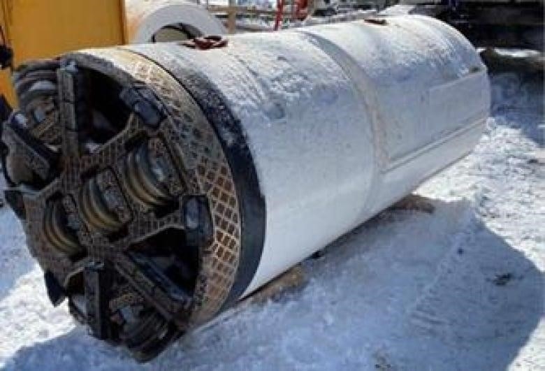 The trapped boring machine 1.5 metres in diameter and five metres in length. City contractors will attempt to remove it in pieces from the tunnel below Old Mill Drive in the coming weeks. 