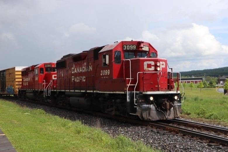 A red train on a track