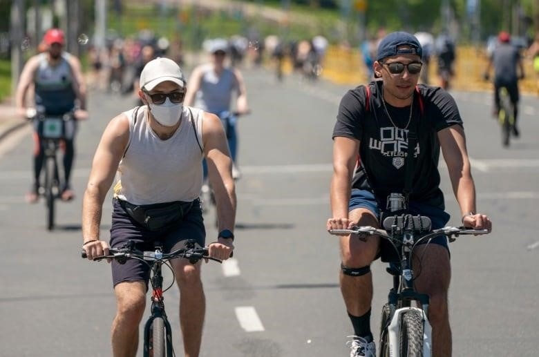 Cyclists are seen riding along Toronto's Lake Shore Boulevard West during a road closure related to ActiveTO.