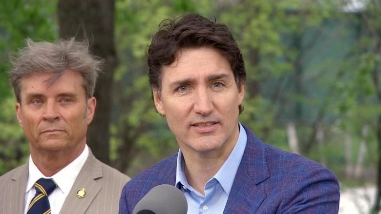 Manitoba Environment Minister Kevin Klein and PM Justin Trudeau photographed at a reannouncement of the new Canada Water Agency, which will protect the country's freshwater supply and be headquartered in Winnipeg on May 24, 2023.