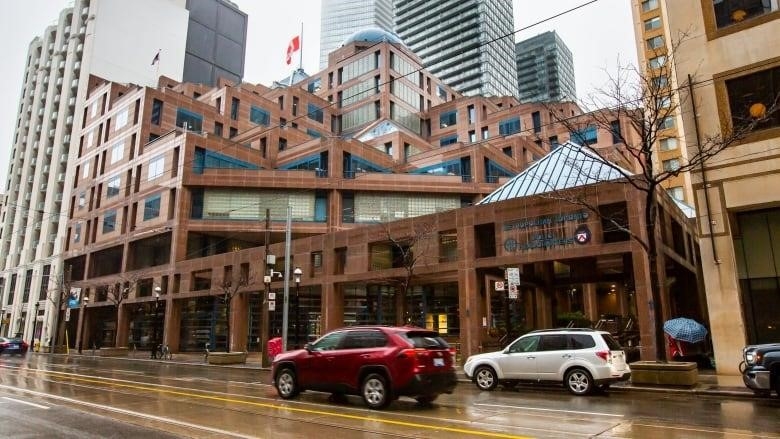 The Metropolitan Toronto Police Headquarters on College Street on a rainy day - January 4, 2023.