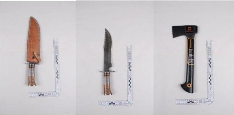 A large knife, a cleaver and an axe are laid on white evidence sheet.
