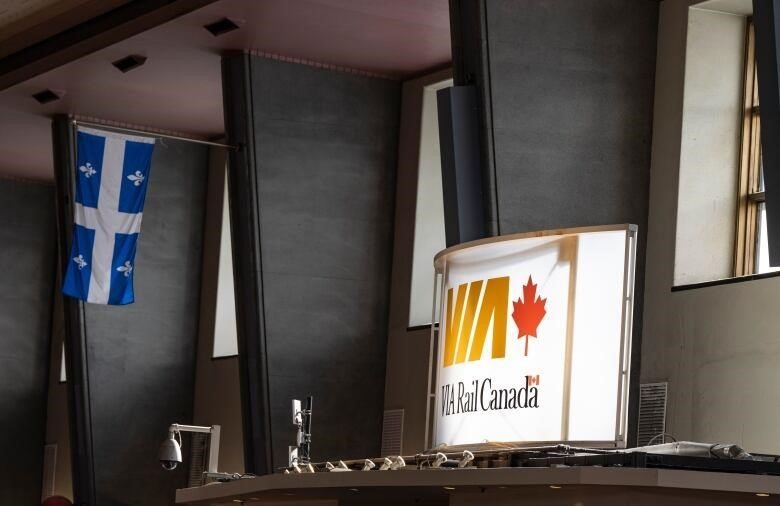 A VIA Rail sign is seen inside Central Station in Montreal, Thursday.