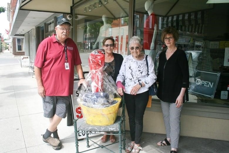 Pictured above, left to right, are councillor John Wright, BIA chair Cindy Devereux, tourist Bonnie Berdan of Glencoe, and Ridgetown business owner Betty Timmermans. 