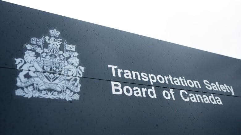 A grey and white Transportation Safety Board of Canada sign.