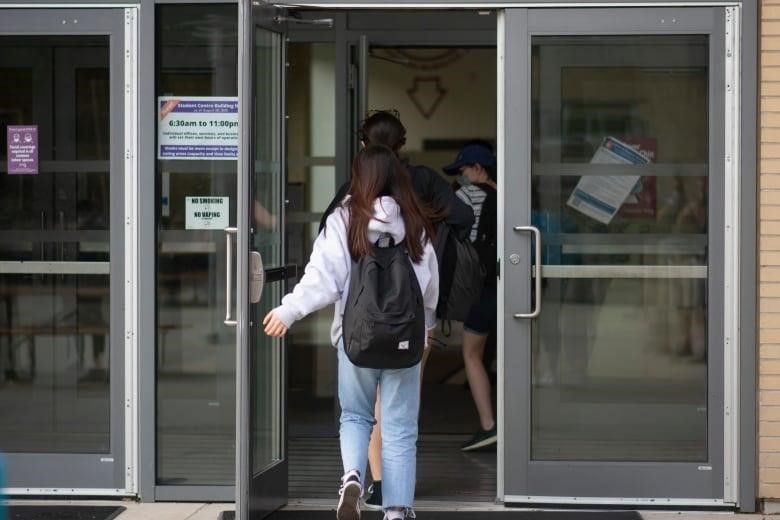 People entering building.