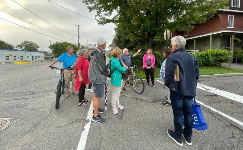 Armed with food, water and naloxone kits, some Vanier residents participated in the inaugural 'Good Neighbours safety walk', Tuesday night. 